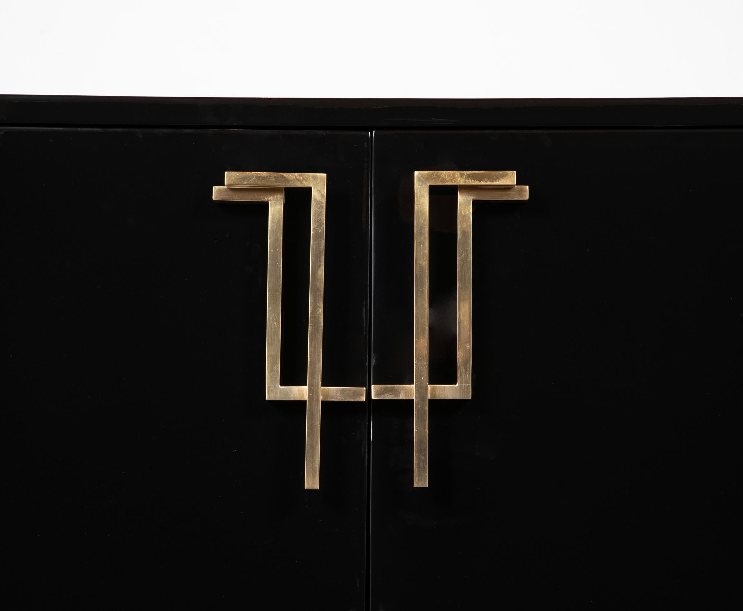 A Maison Jansen Black Lacquer Cabinet with Gilded Brass Accents For Sale 1