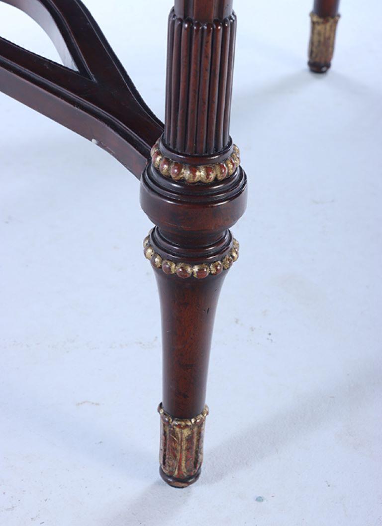 Bronze A Maitland smith crotch mahogany center table having a tessellated marble top For Sale