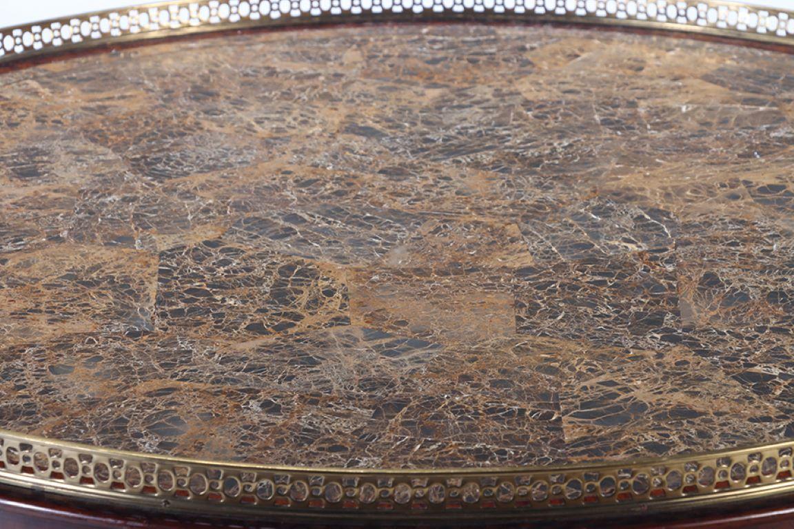A Maitland smith crotch mahogany center table having a tessellated marble top For Sale 3