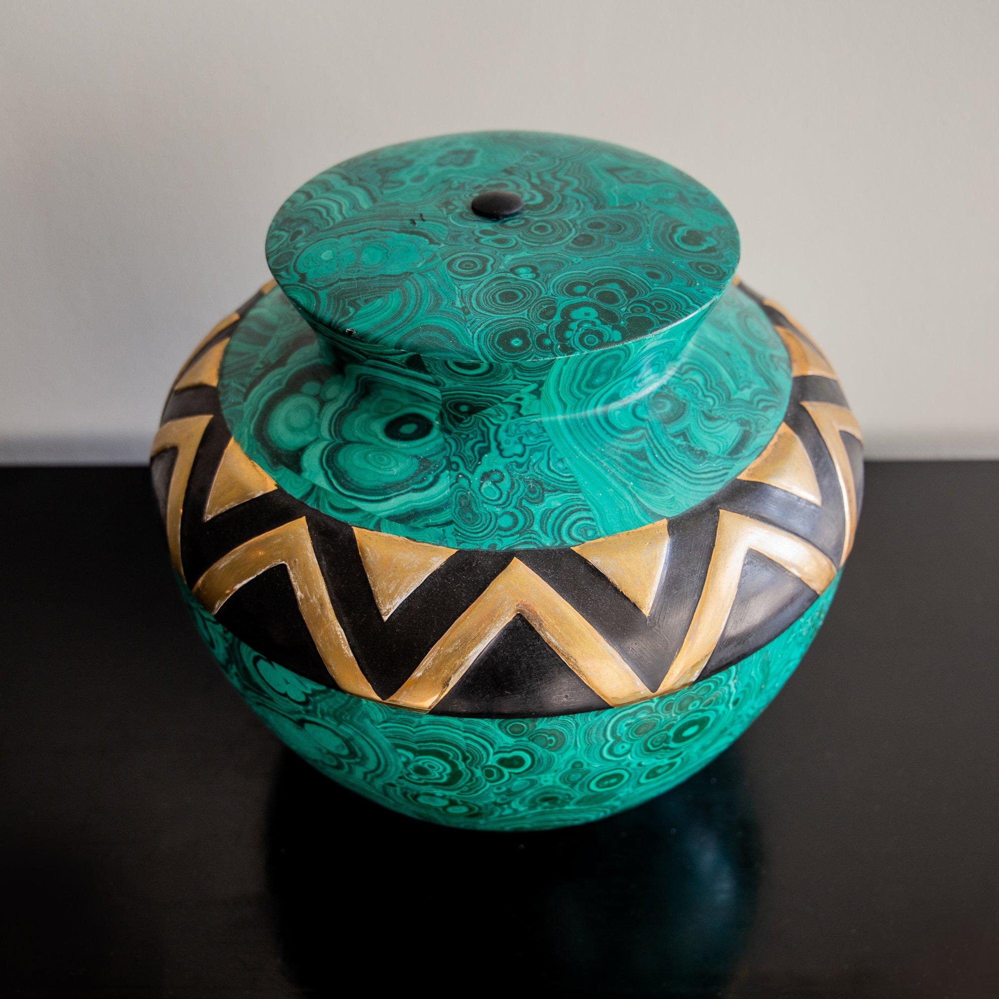 Impressive centrepiece in ceramic by Tommaso Barbi, decorated in his signature malachite finish with feature gilt zig zag frieze on black band. 