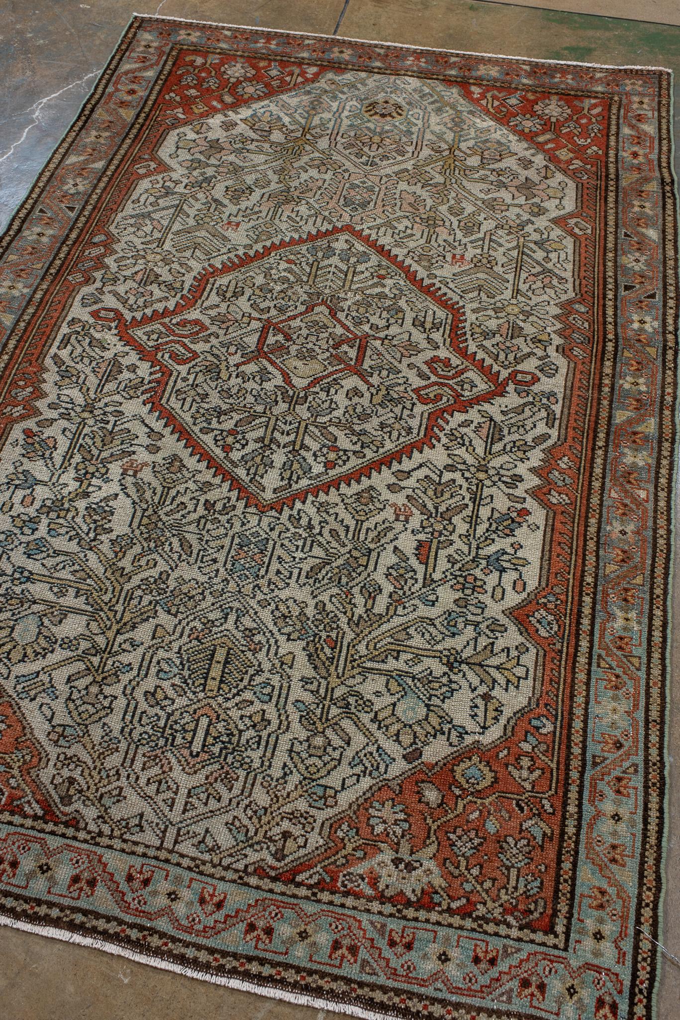 A Malayer Rug circa 1920. Handknotted with 100% wool yarn.