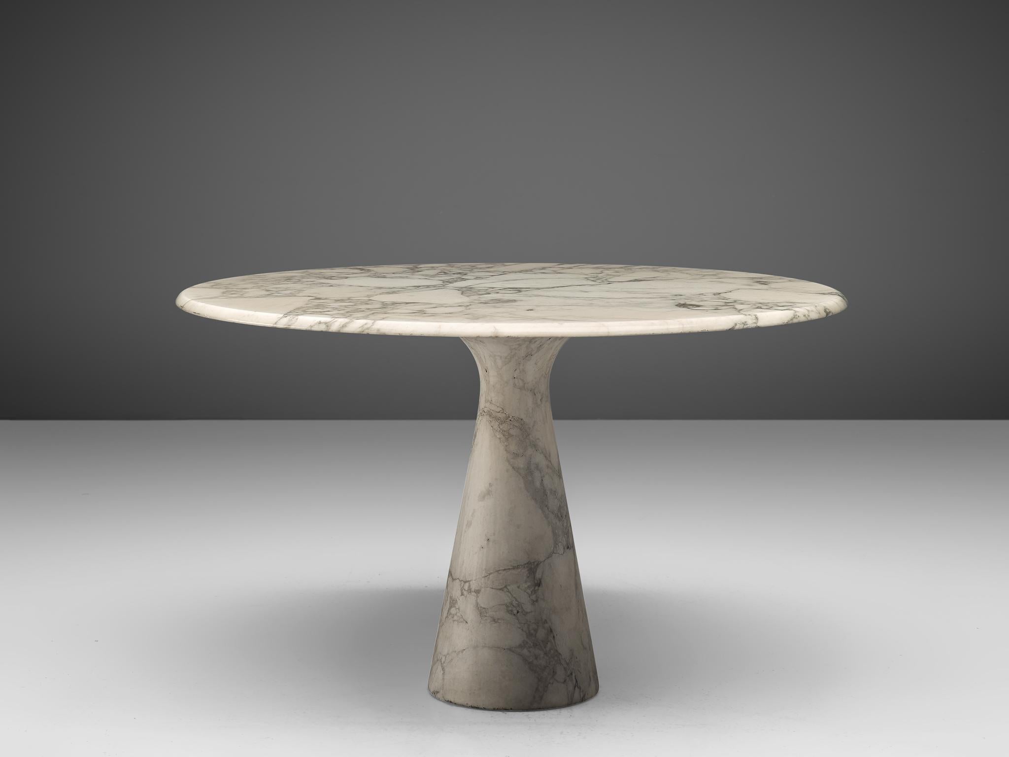 Angelo Mangiarotti for Skipper, 'M1' dining table, marble, Italy, design 1969

Angelo Mangiarotti designed the 'M1' dining table for Skipper in 1969. On a cone shaped pedestal rests the round tabletop. The white marble shows a dynamic grain and so