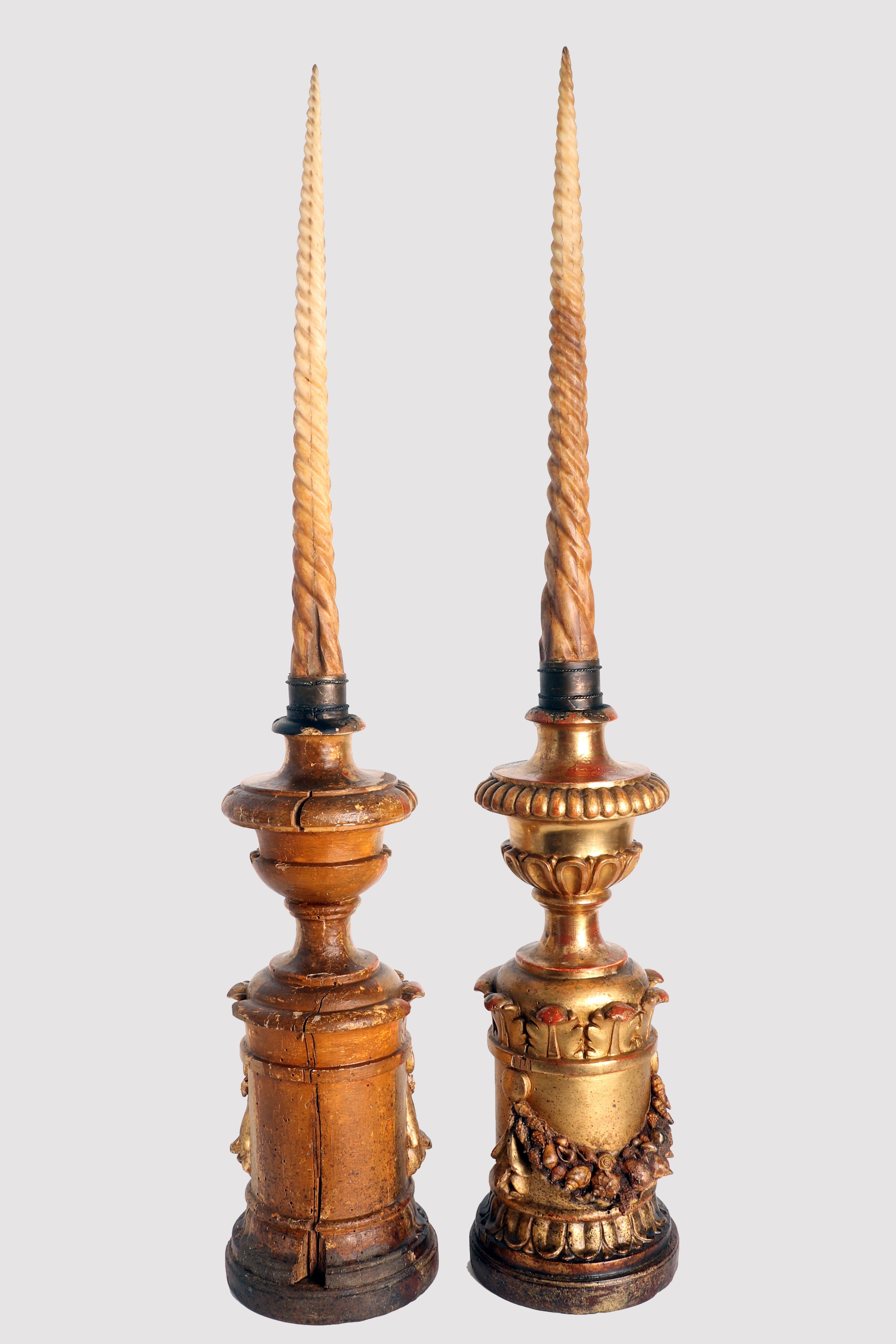 An important pair from Wunderkammer: two Marlin fish rostrum turned to emulate the spiraling shape of the Narwhal tusk.
The base is made of fruit wood according to a neoclassical altar layout. On the smooth drum base a step and a sequence of