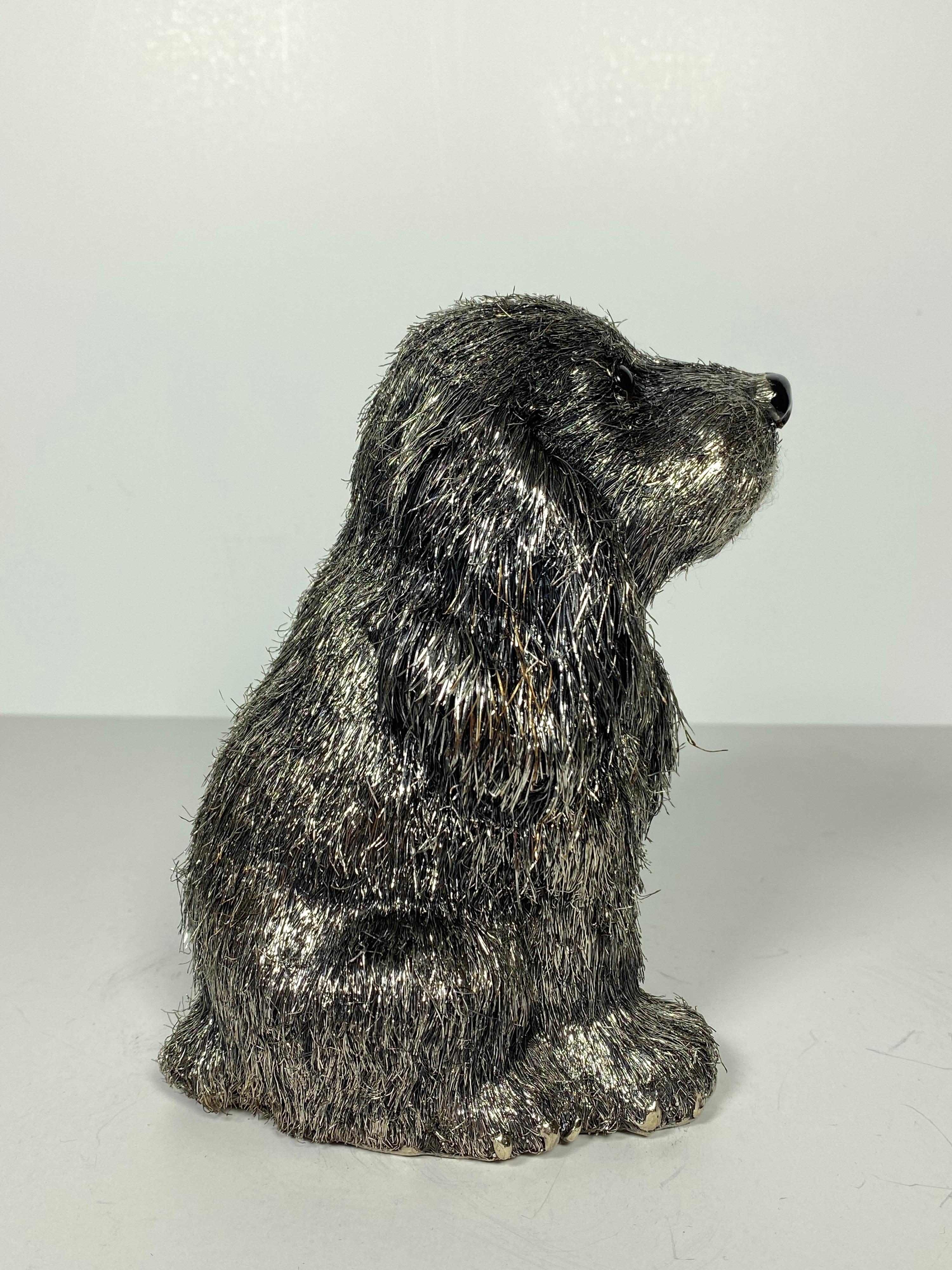 A Mario Buccellati Furry Animals Charming Dog, circa 1960

Standing 6” tall, this charming subject catches many eyes. Signed underneath M. Buccellati .925 Italy 

Buccellati: The Buccellati family has been perfecting the art of goldsmithing