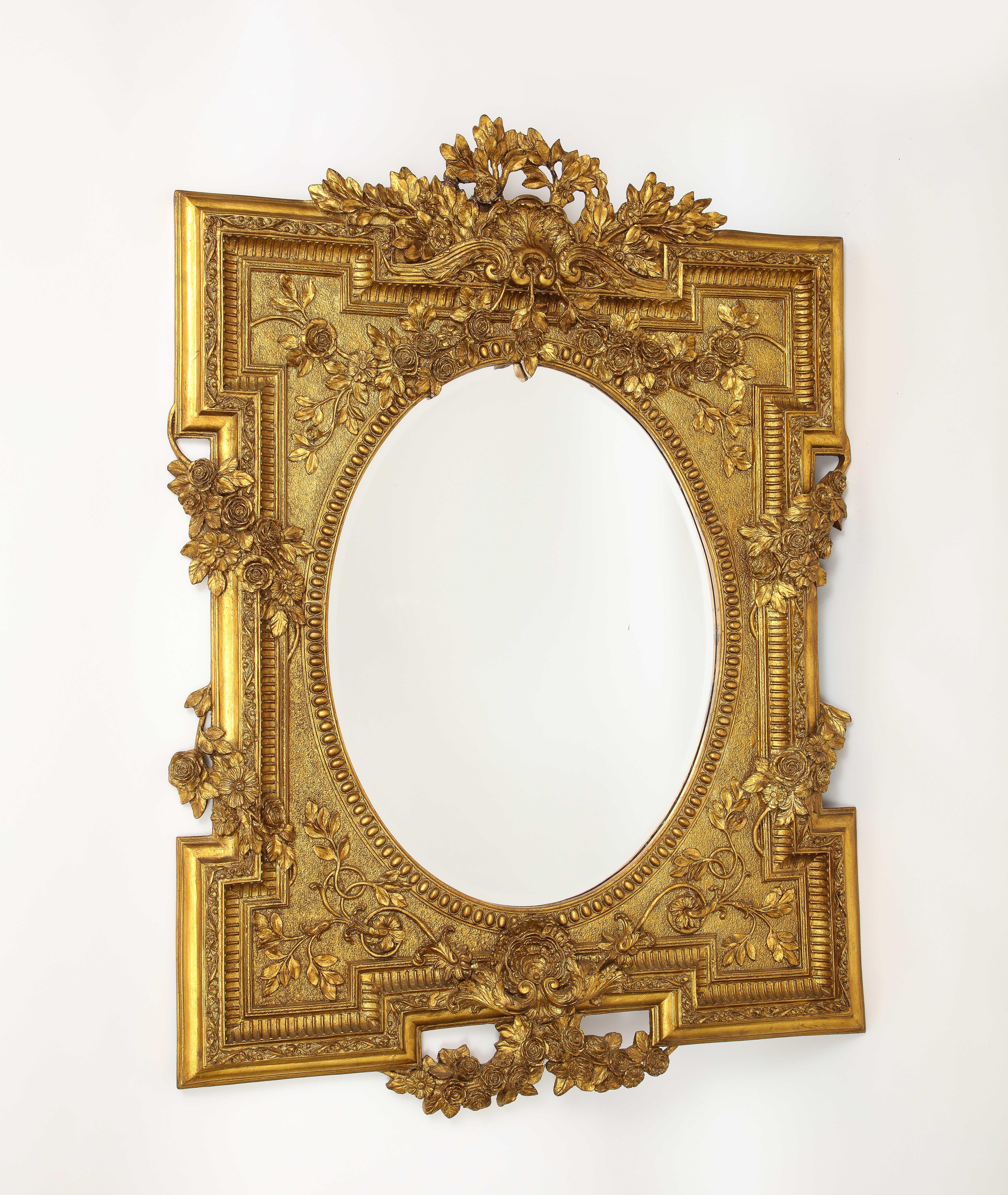 Louis XVI Marvelous French Giltwood Hand-Carved Beveled Mirror with Floral Vine Designs For Sale