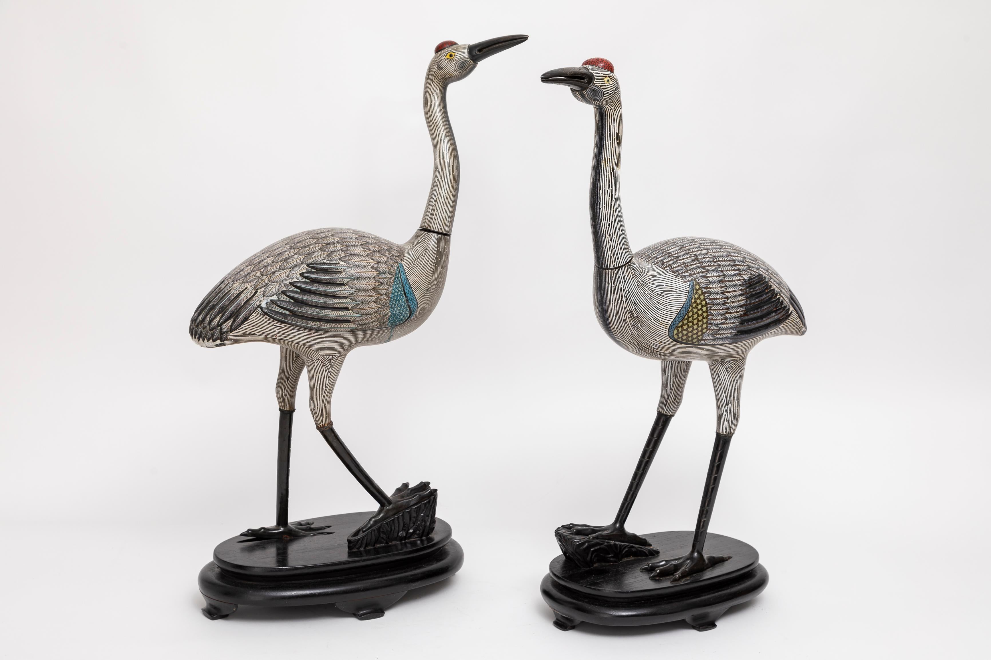A Marvelous Pair of Chinese Cloisonné Figures of Cranes on Stands, Qing Dynasty In Good Condition In New York, NY