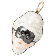 A Masked Lady Porcelain and Silver Gilt Pendant