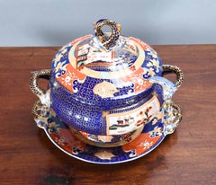 A Mason's Ironstone Soup Tureen with Cover, Stand, and Ladle