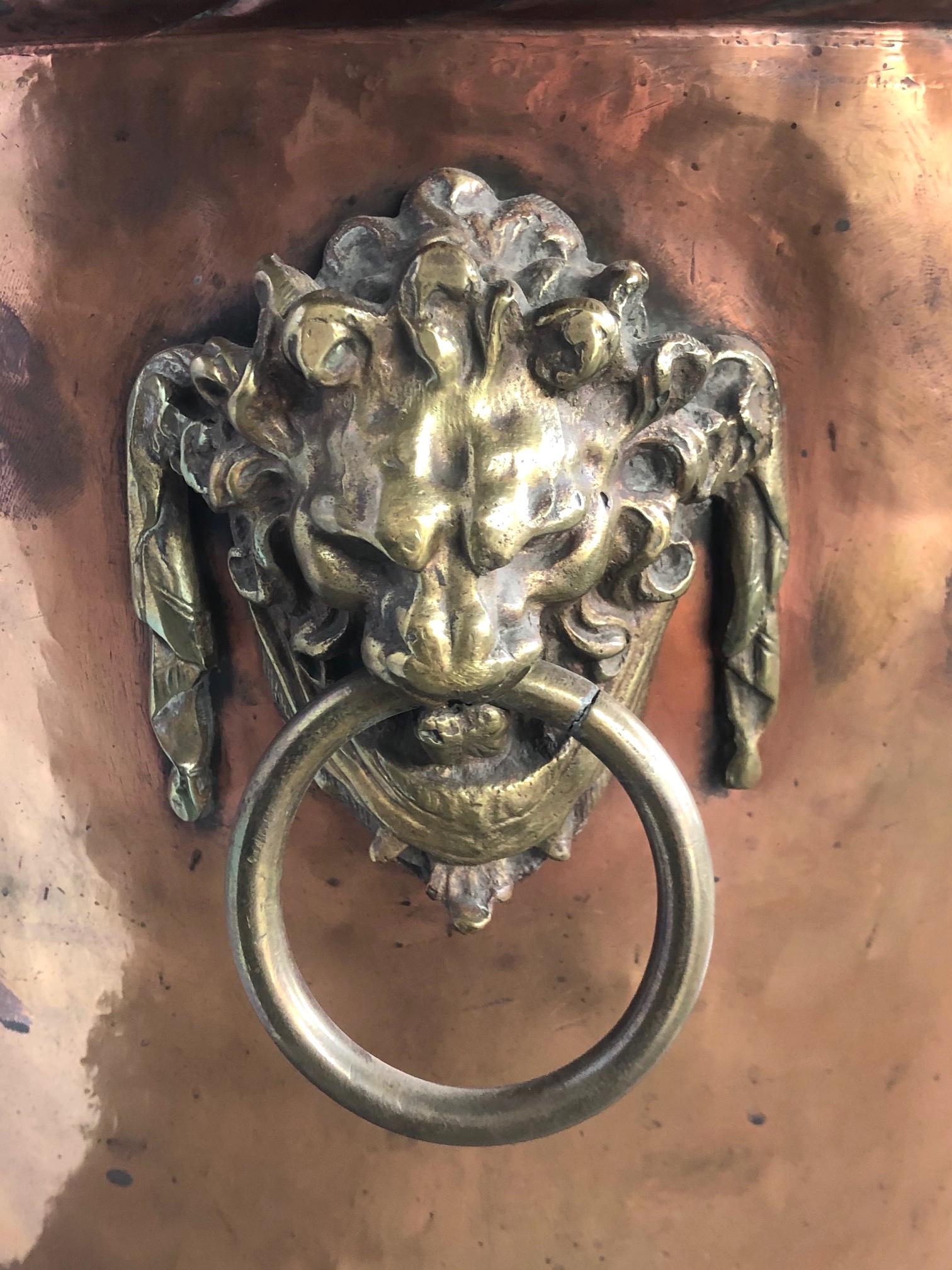 A Massive English Brass and Copper Log Bin with Armorial Crests 1