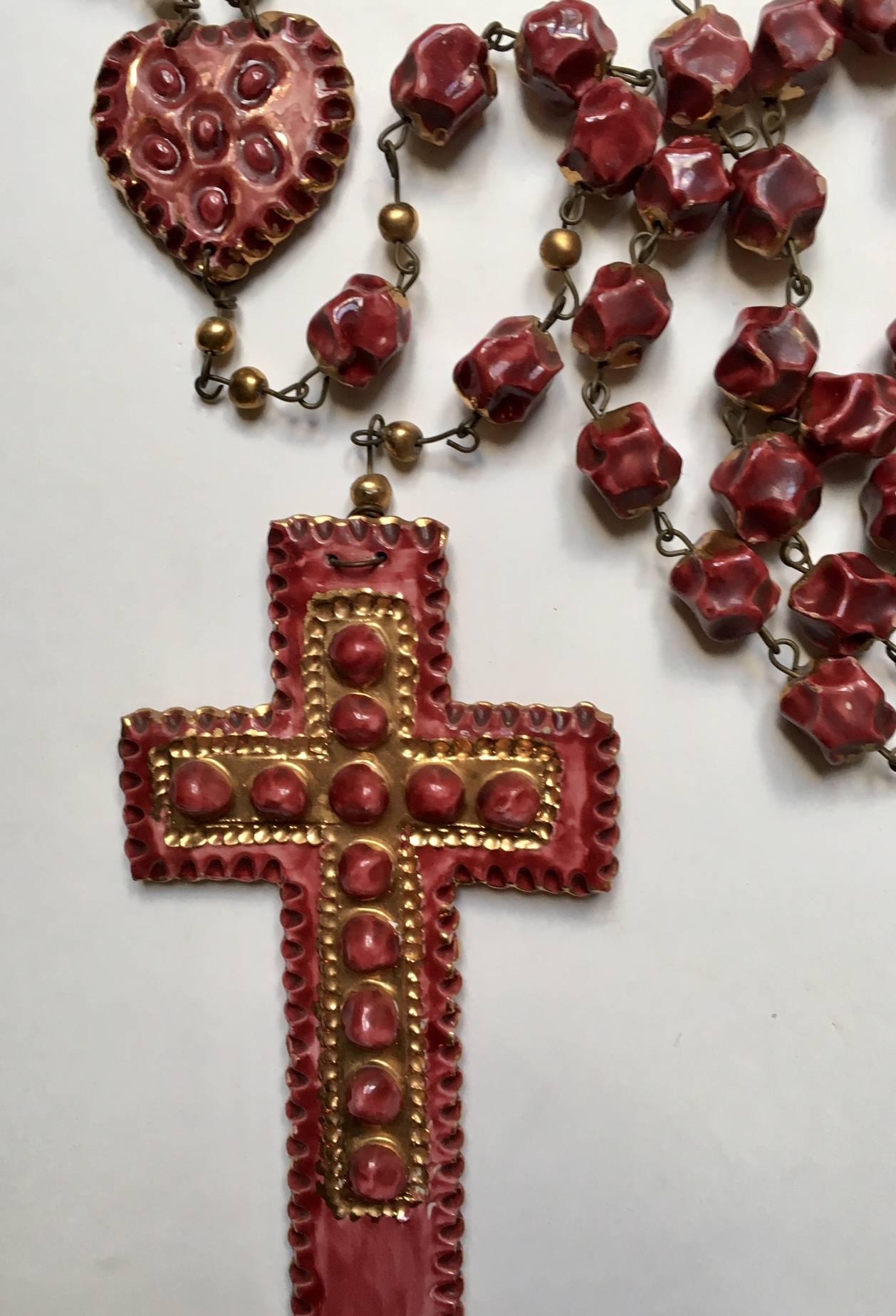 A massive Mazzotti rare ceramic rosary by renowned manufacturer VMA (mazzotti) Albisola, Italy,
circa 1970.
Purple and gold ceramic and gold plated metal fixtures.
Full length 200 cm (the cross only measure 24x14 cm)
stamped VMA ESA.

  