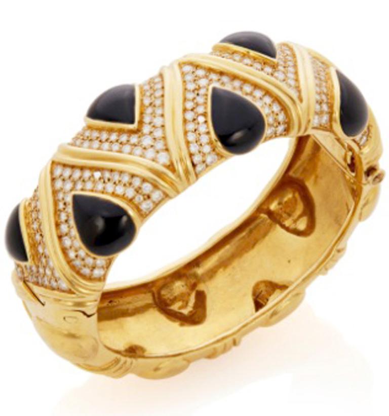 Massiver Onyx- und Diamantarmband aus 18 Karat von Gemlok
Tauchen Sie ein in die Welt des Vintage-Luxus mit unserem atemberaubenden Armreif 