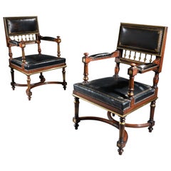 Used Matched Pair of 19th Century French Brass Mounted and Leather Armchairs