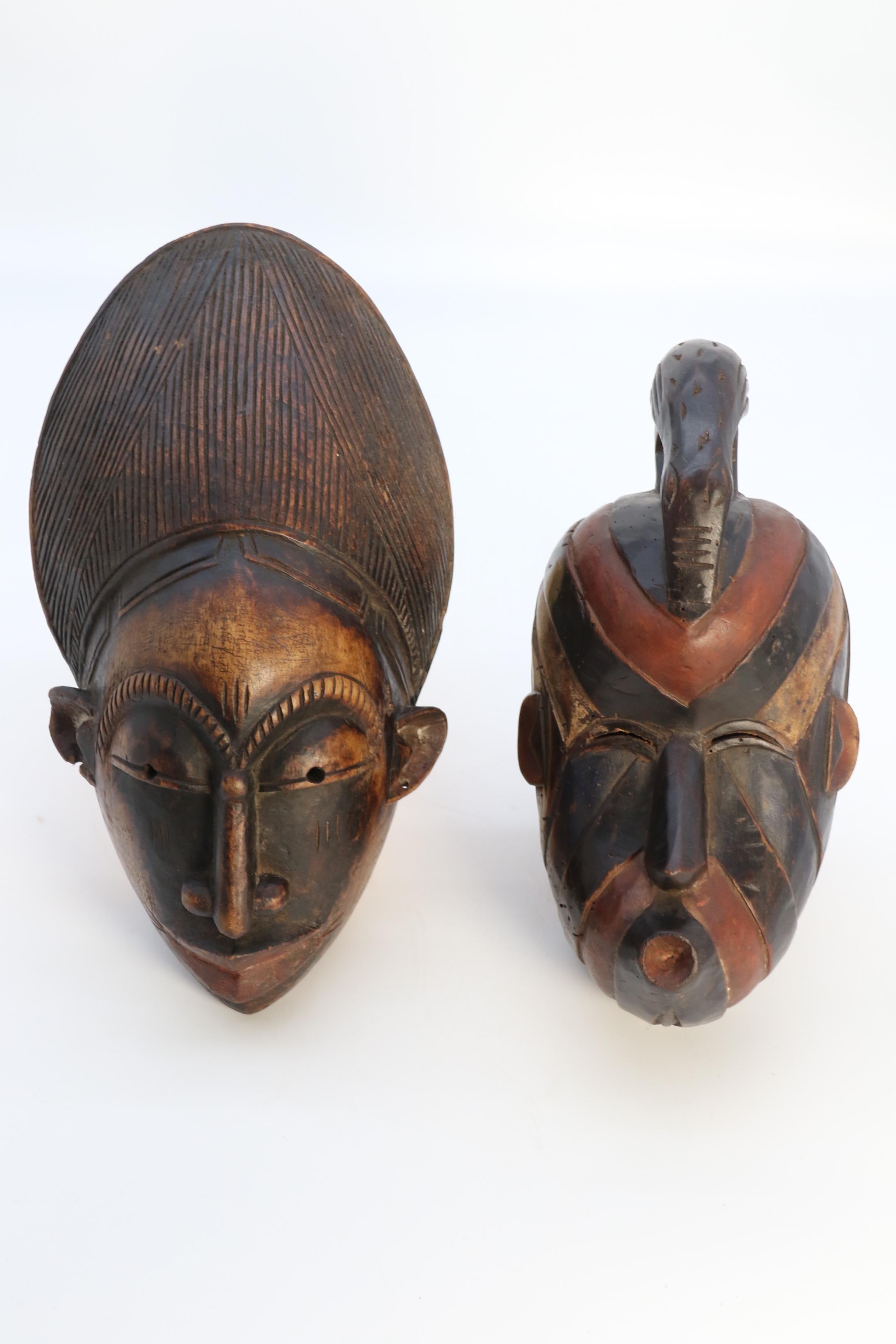Other A matched pair of African tribal dance face masks, circa 1920