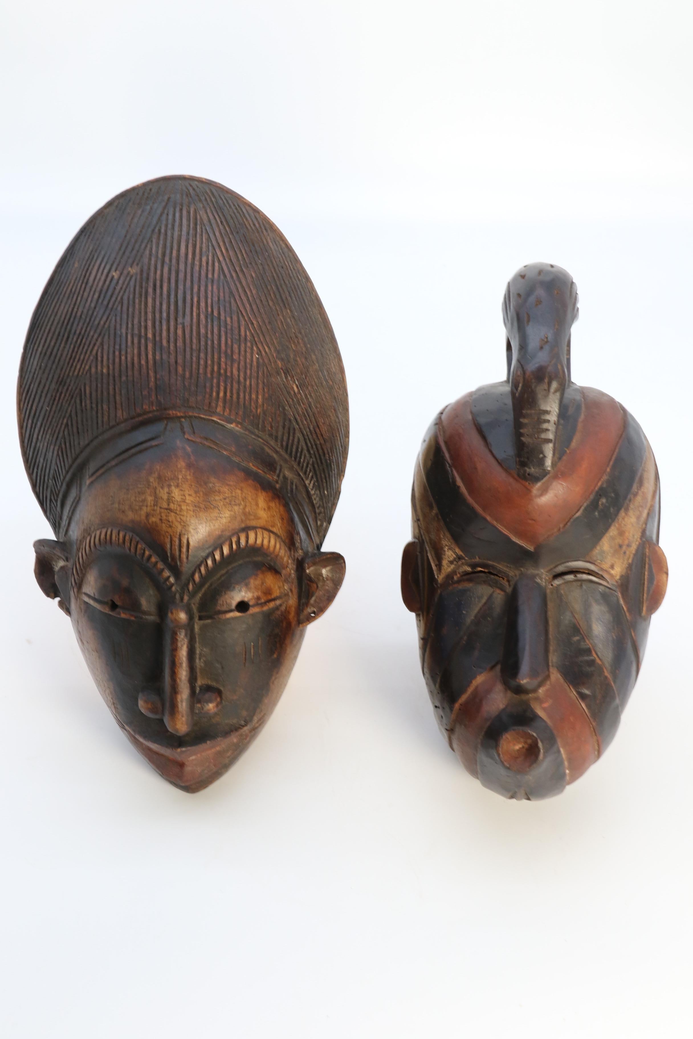 A matched pair of African tribal dance face masks, circa 1920 In Good Condition In Central England, GB