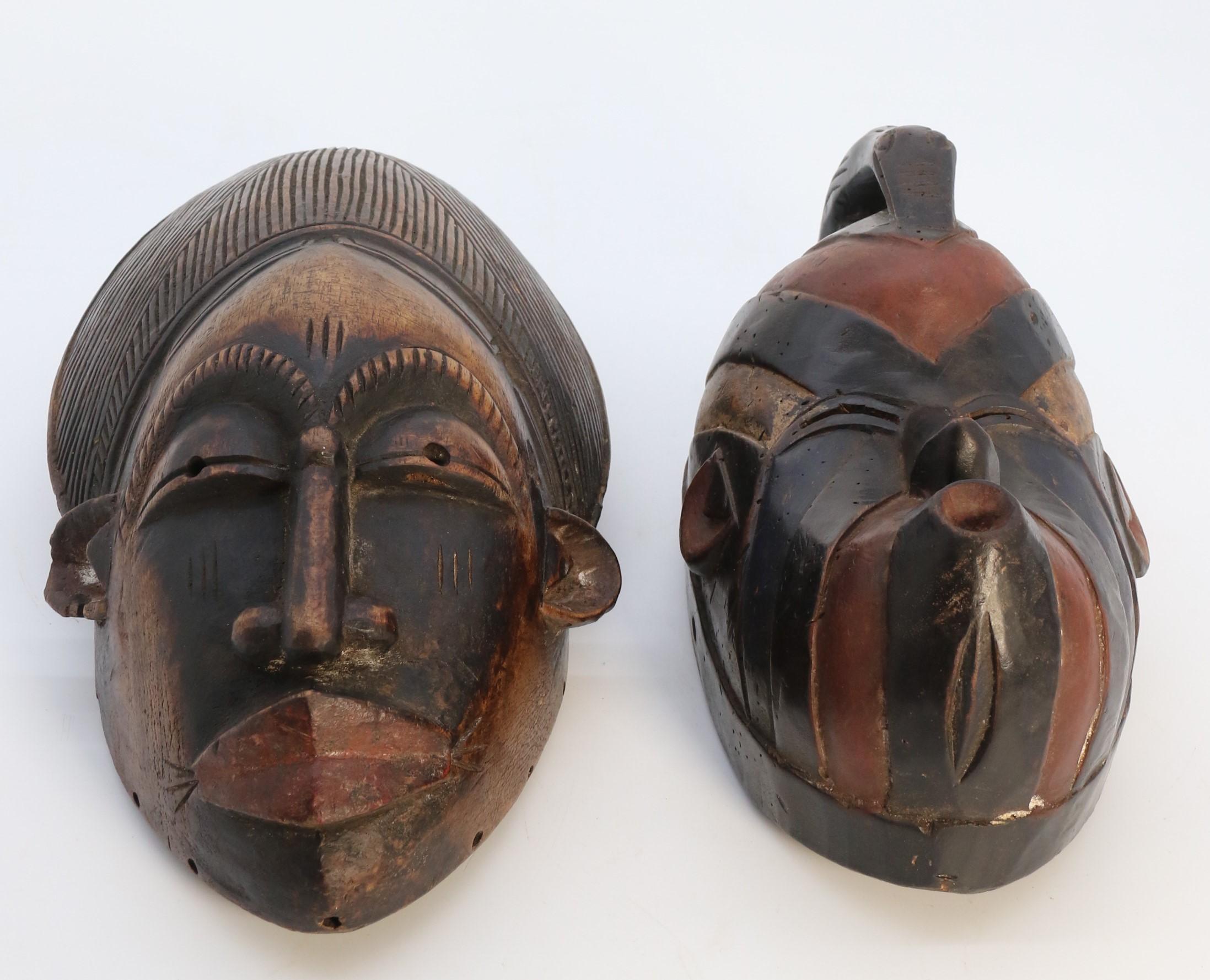 Early 20th Century A matched pair of African tribal dance face masks, circa 1920