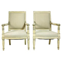 A matched pair of Dennis & Leen Armchairs
