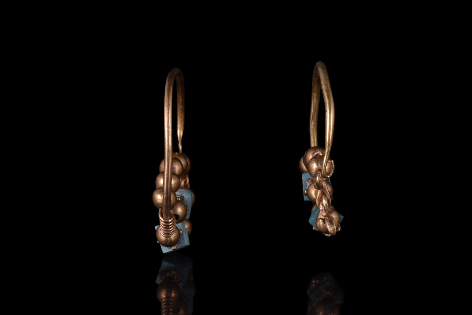 Medieval A Matched Pair of Gold Earrings For Sale