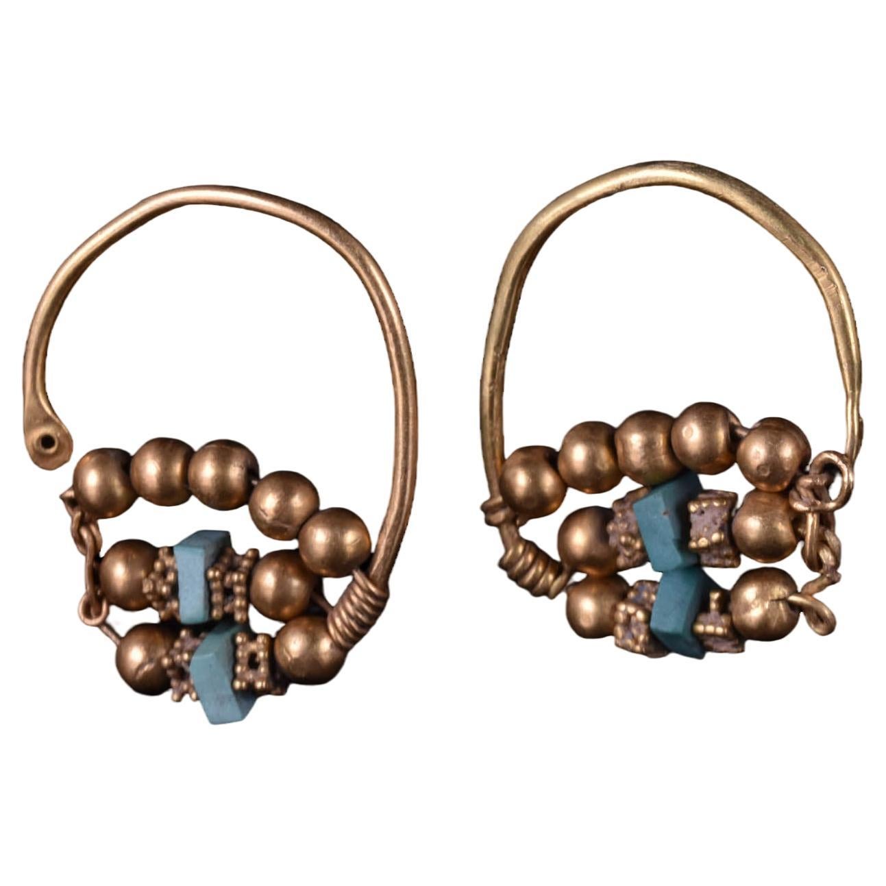 A Matched Pair of Gold Earrings