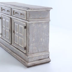 A matched pair of Italian eighteenth century painted walnut servers