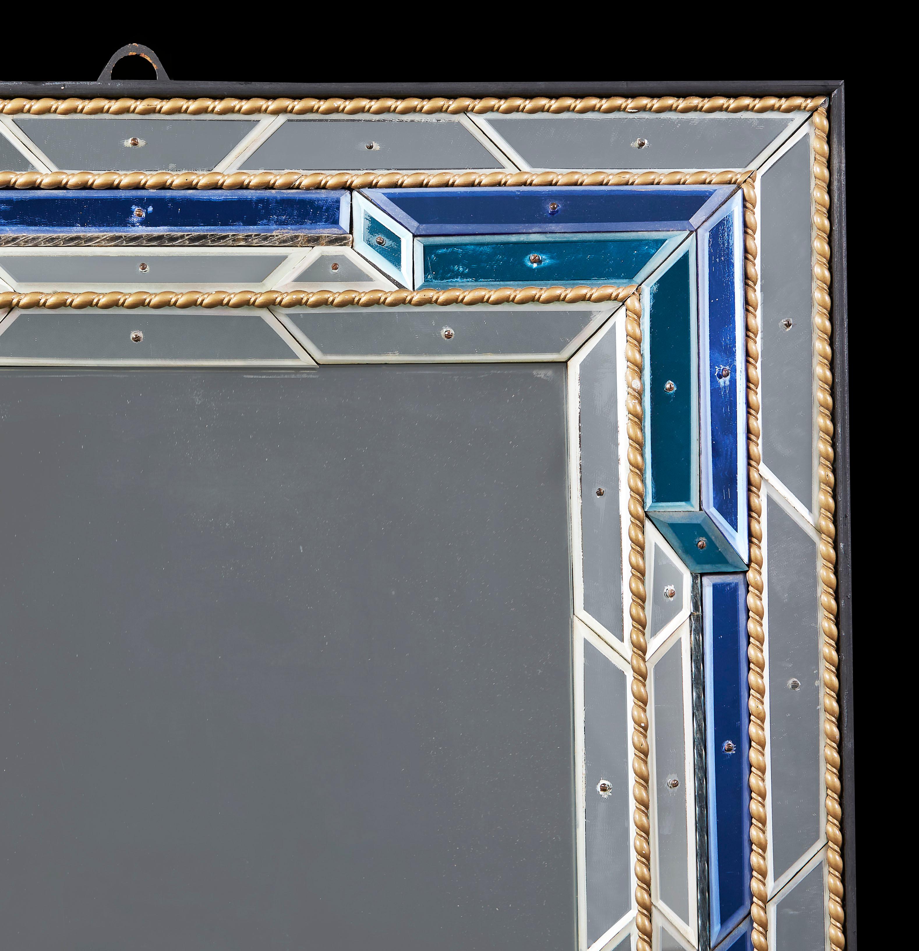 A Matched Pair of Overscale Mid-Century Venetian Mirrors with Blue Border 1