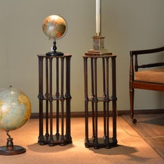 A matched pair of Regency octagonal oak whatnot or etagere or side tables
