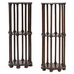 A matched pair of Regency octagonal oak whatnot or etagere or side tables