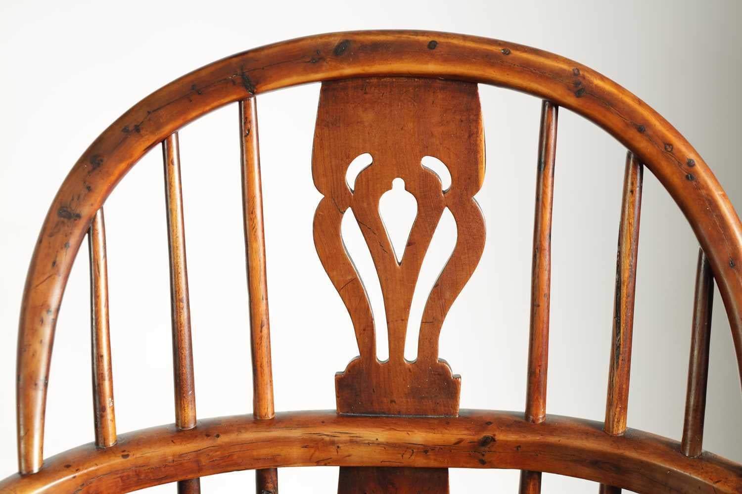 English A Matched Set of Four Yew-Wood Low Back Windsor Chairs 