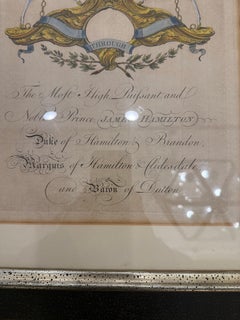A Matching Pair of 19th Century Hand-Colored Armorial Engravings