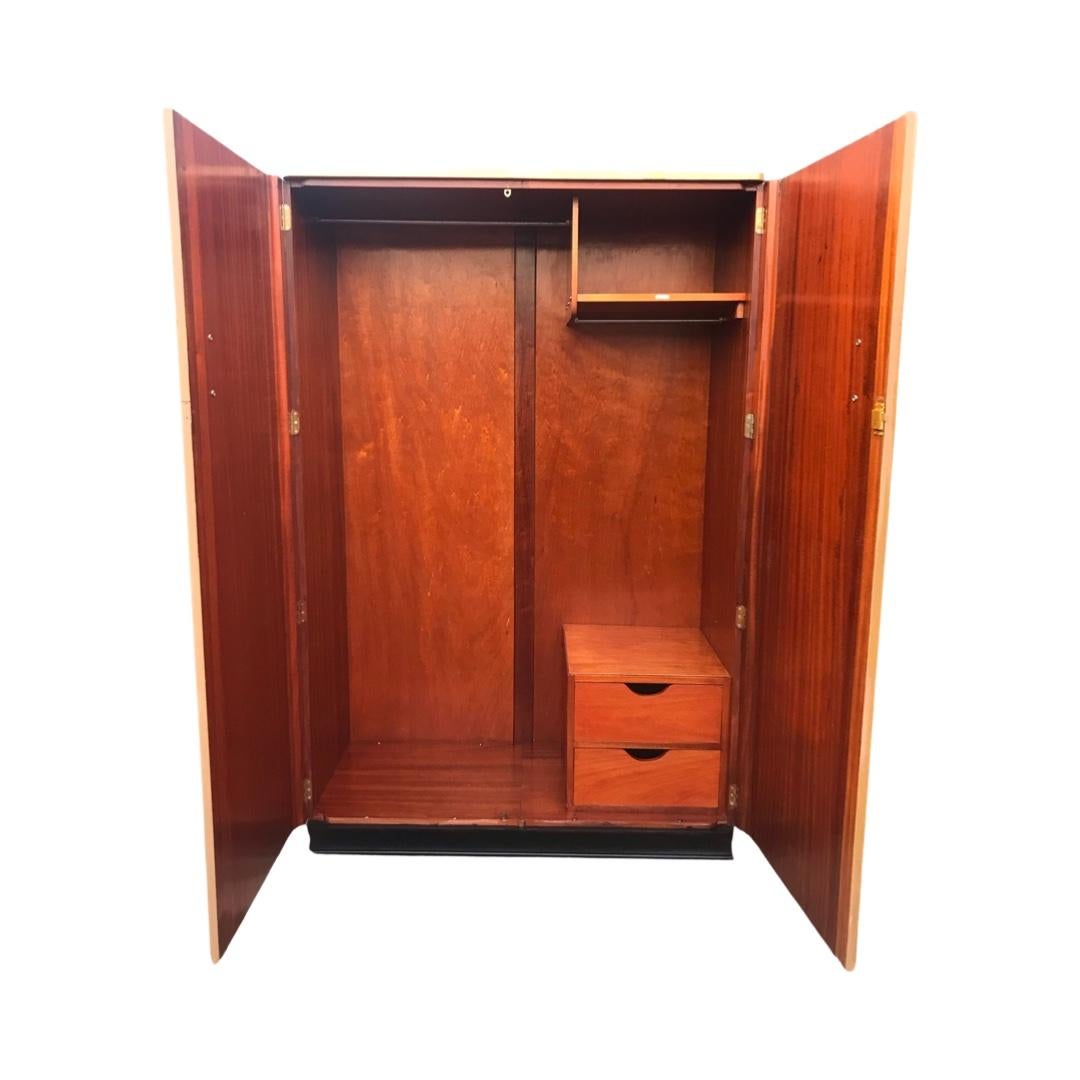 European A matching pair of Art Deco Pale Walnut Wardrobes in the style Epstein For Sale