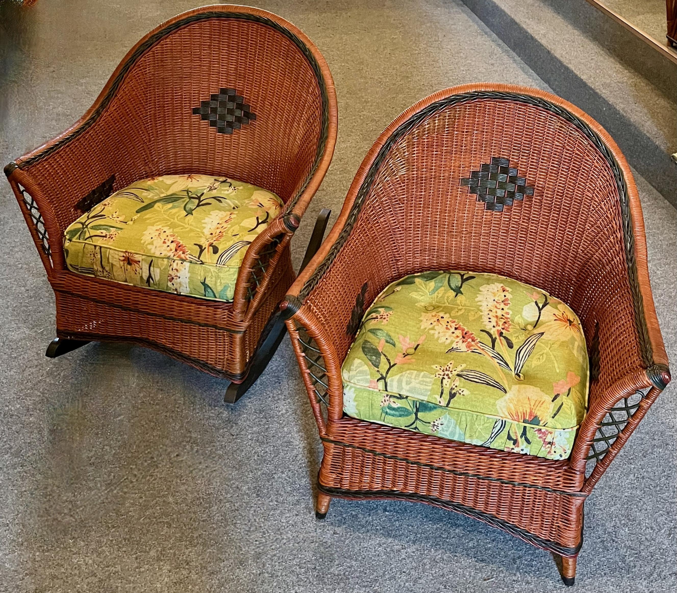 A handsome pair of matching wicker arm and rocking chair in a design hand woven and typical of the Arts and Crafts period, American,
C. 1900-1920 and attributed to the Heywood Wakefield Company,Gardner,Massachusetts.
The matching pair of chairs are