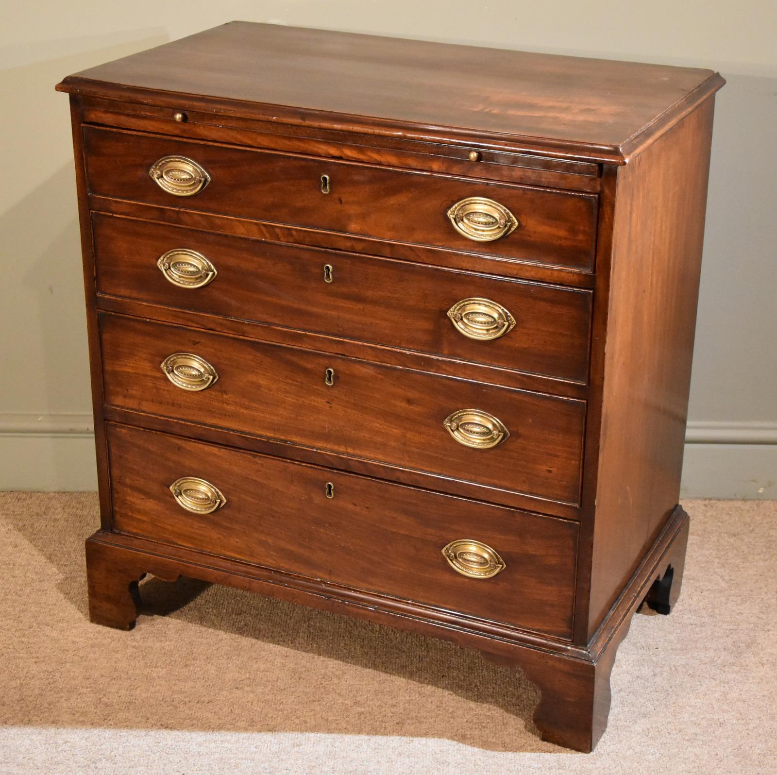 A matching pair of George III mahogany chest of drawers. Pair of matching chests one with brushing slide. These would look fantastic either side of a bed or fireplace.
 
Dimensions:
Height 33