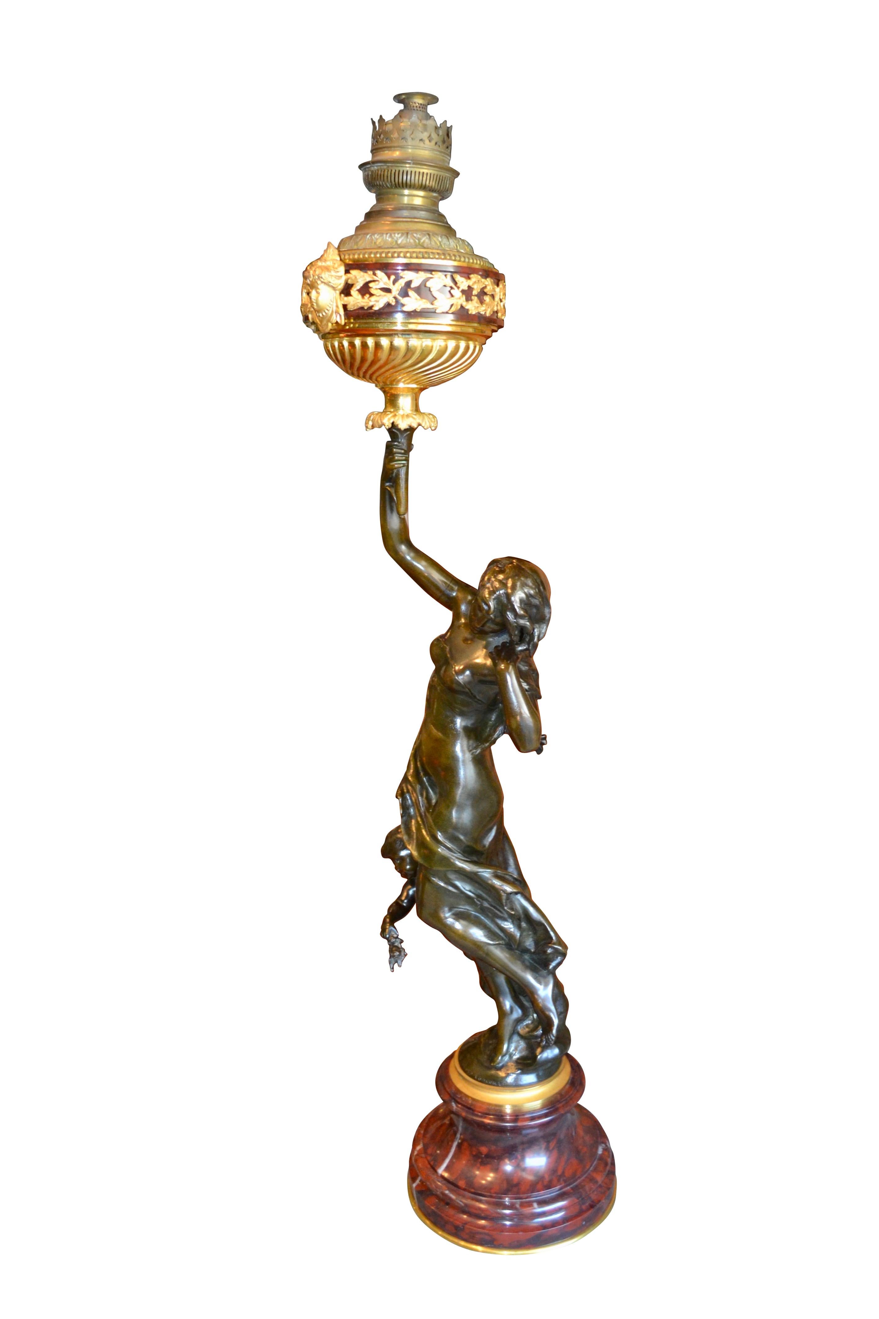 Français  Lampe à l'huile représentant une statue en bronze de Mathurin Moreau  a Nymphe et Putto   en vente