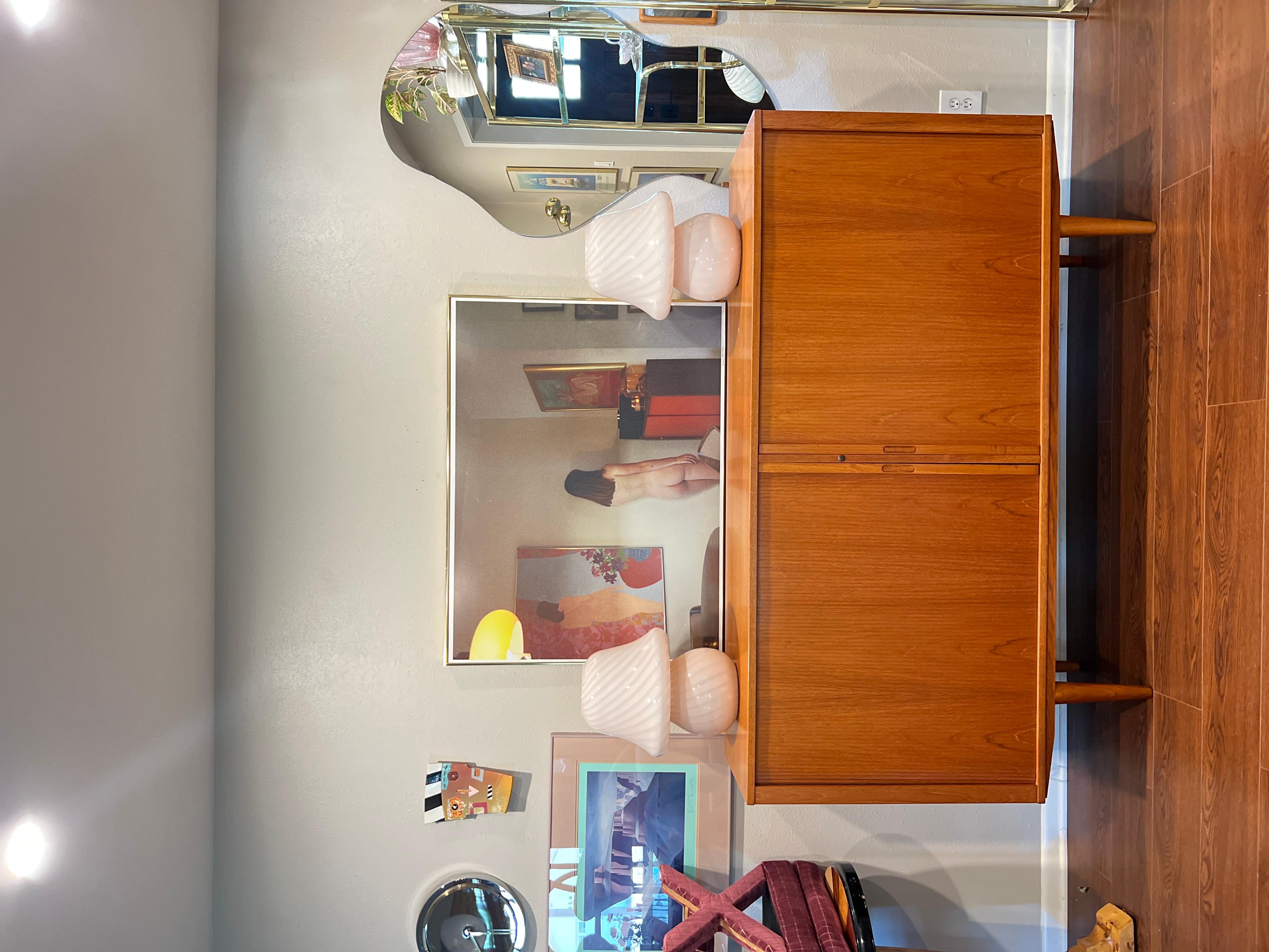 A MCM minimalist teak tall sideboard with tambour doors and tapered legs 6