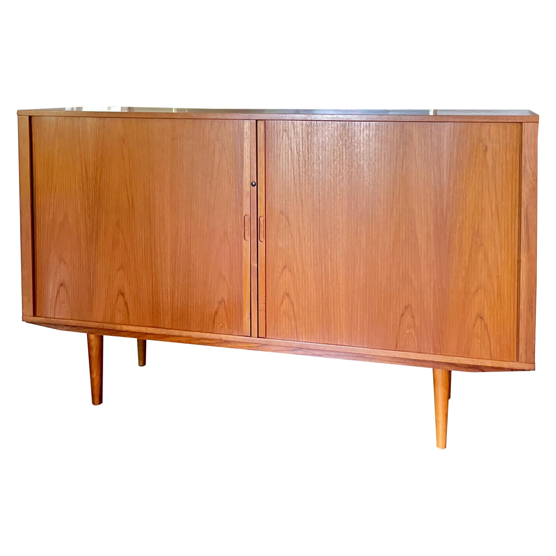 A MCM minimalist teak tall sideboard with tambour doors and tapered legs