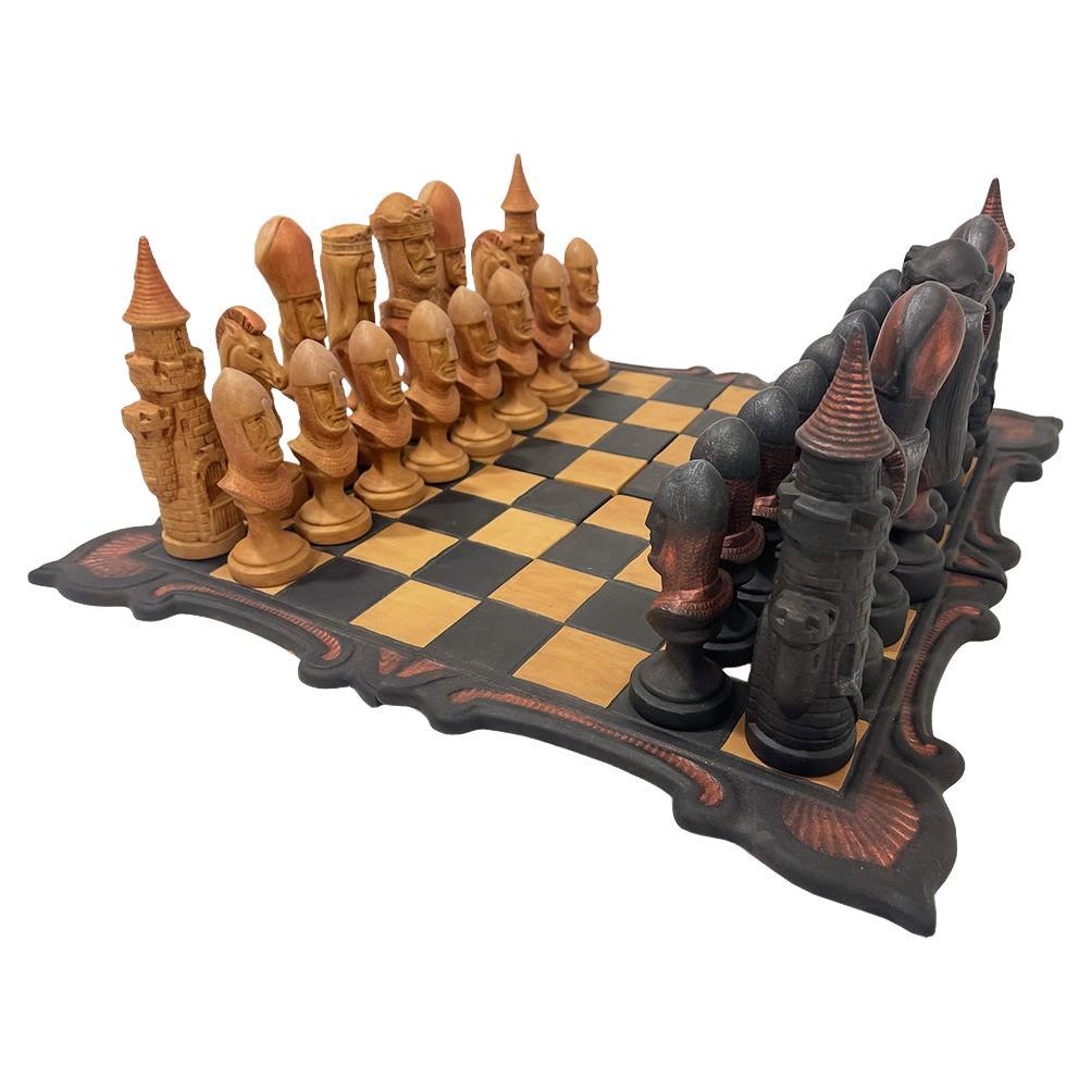 A medieval style chess set made in cast clay For Sale