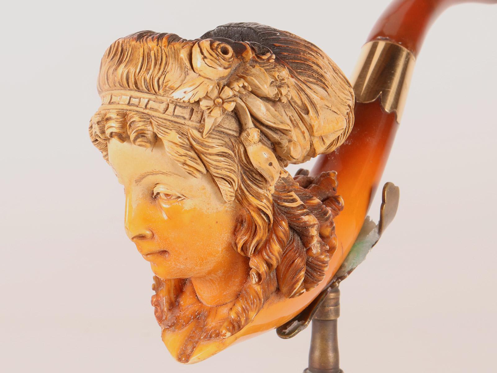 Austrian A meershaum pipe: a woman's head with with flower in hairstyle, Vienna 1890