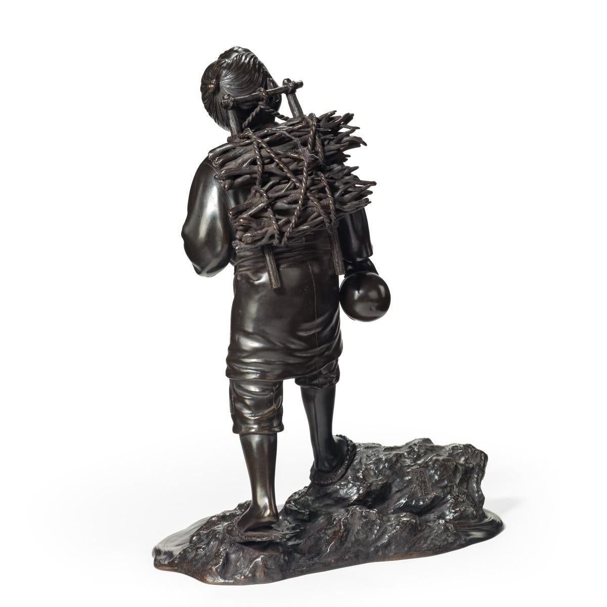 Meiji Period Bronze of a Boy Carrying Twigs In Good Condition For Sale In Lymington, Hampshire