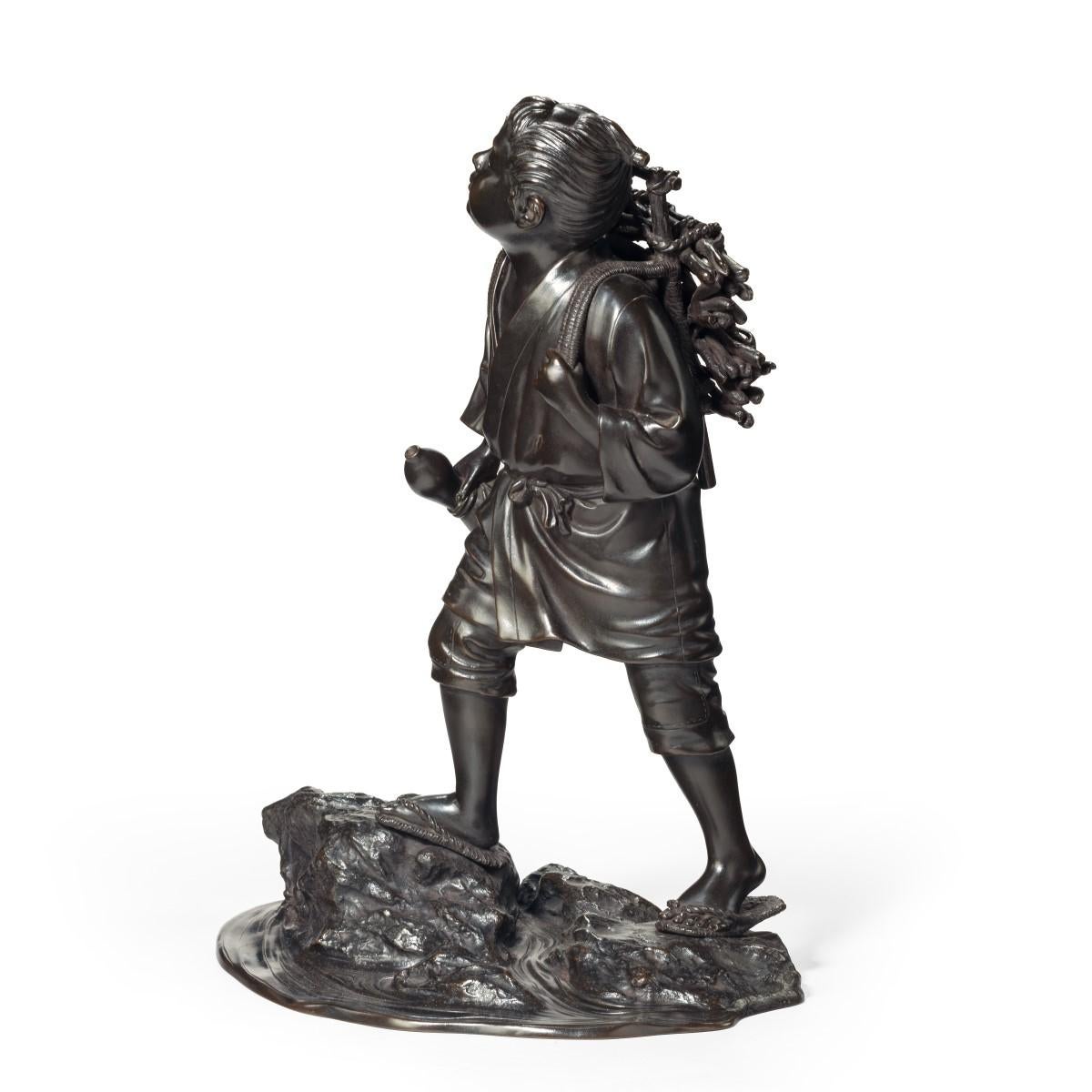 19th Century Meiji Period Bronze of a Boy Carrying Twigs For Sale