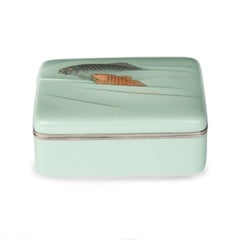 A Meiji period moriage cloisonné box and cover with two carp