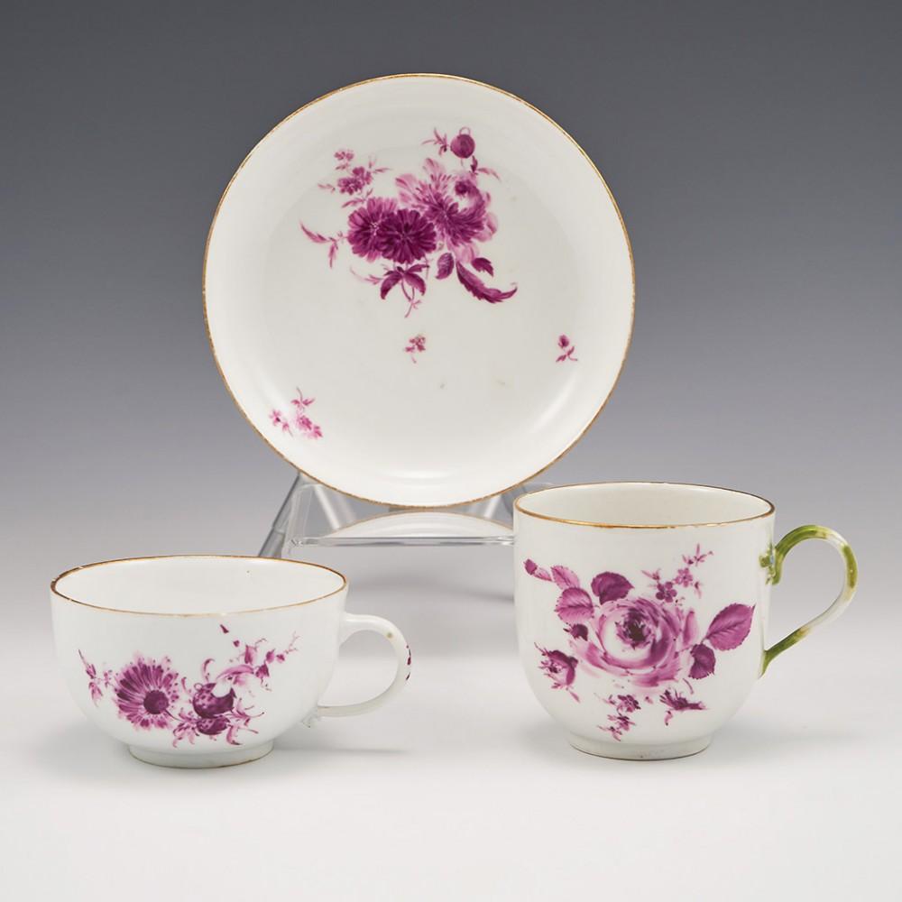 A Meissen Dot Period Porcelain Tea Cup and Saucer and Coffee Cup, 1763 - 1774

Additional information:
Date : 1763 - 1774
Period : Augustus III
Marks : Underglaze blue crossed swords their hilts interspaced by a single dot
Origin : Meissen, Saxony,
