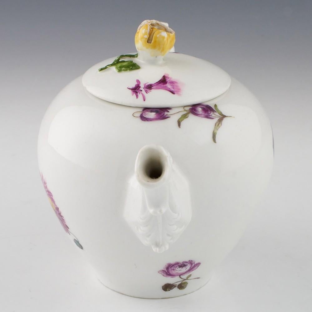Eric Knowles Comments: This style of teapot with the same animal type spout and handle were produced by Meissen for a forty year period from 1730 onwards. The decoration dictates that this ws made at the latter end of this date range

Heading :  A