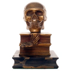 A Memento Mori depicting a skull resting on books, France 1930s.