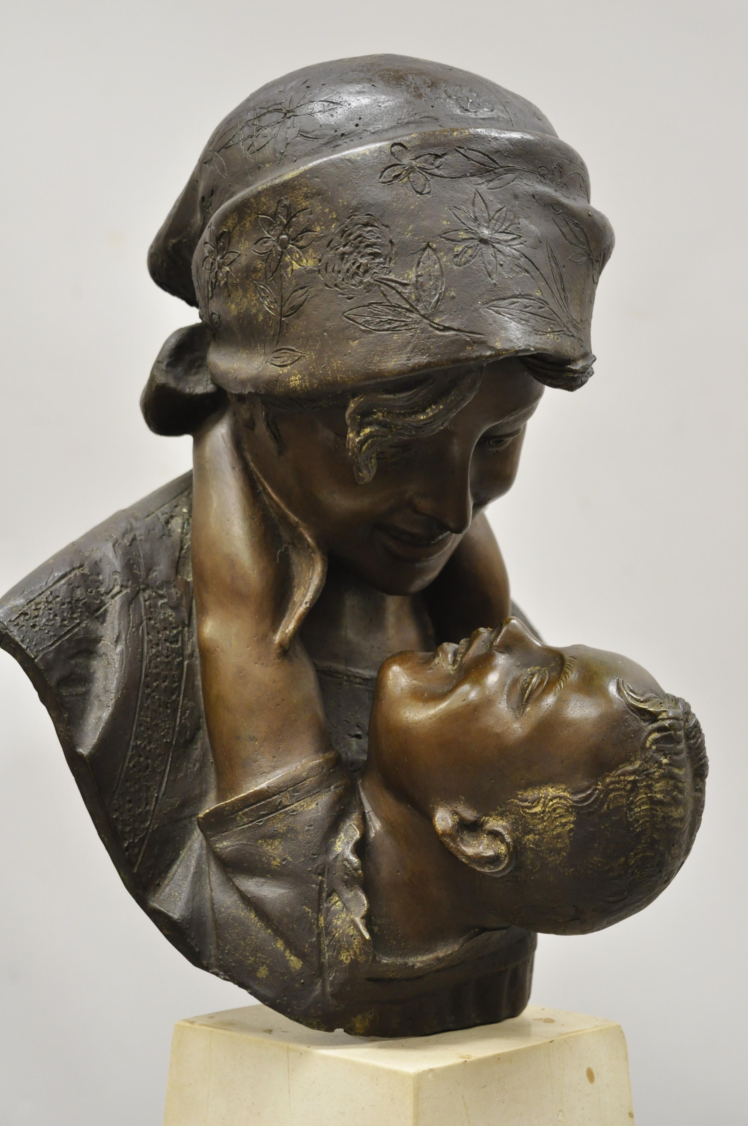 A. Merente Maternita spelter metal travertine bronze mother child bust sculpture statue. Item features cast spelter metal figure on travertine stone base, marked, 
