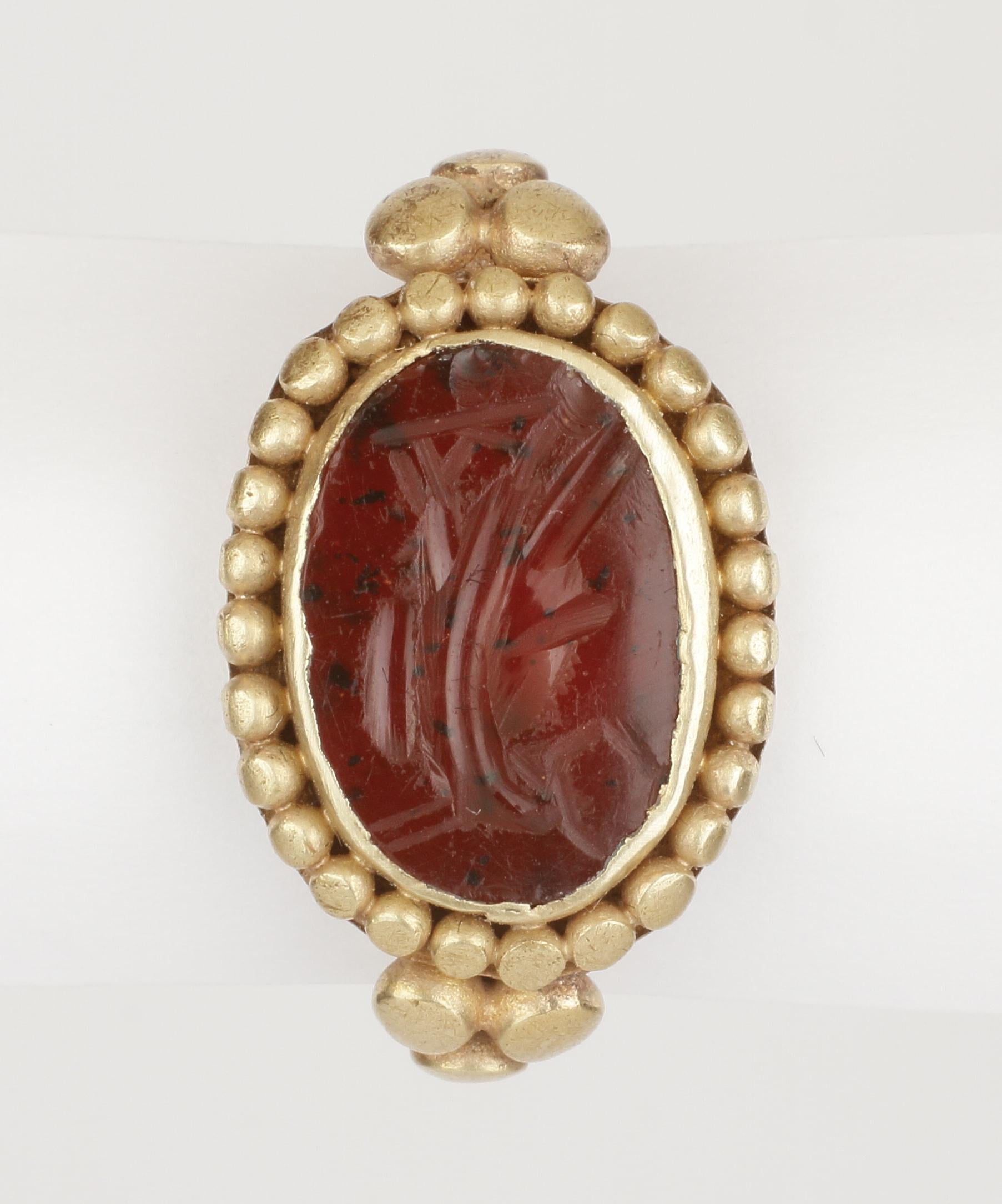 A Merovingian Frankish Gold Finger-Ring with a Re-used Late Imperial ...
