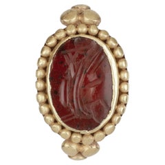 A Merovingian Frankish Gold Finger-Ring with a Re-used Late Imperial