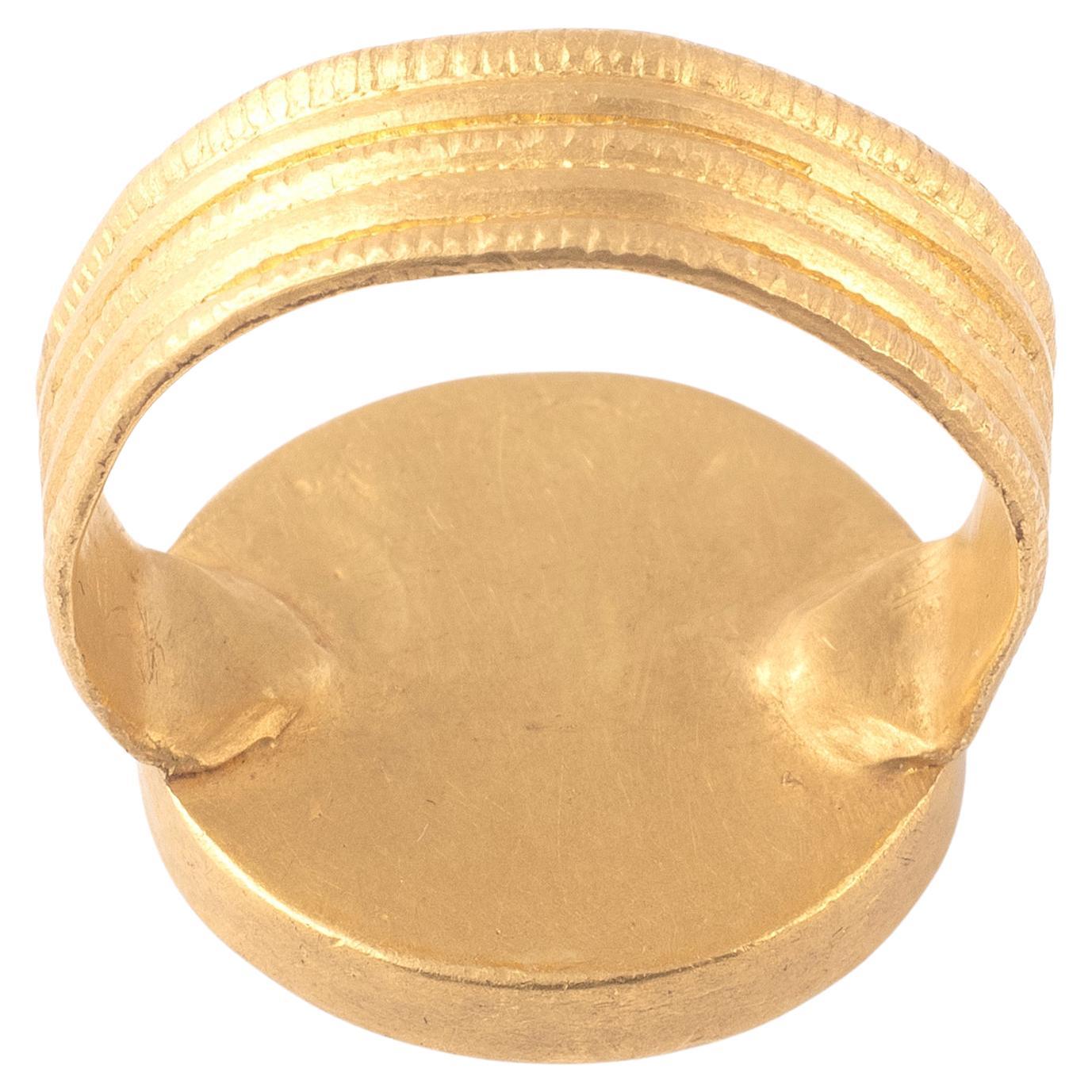 Uncut A Merovingian High Karat Gold And Garnet Finger Ring Circa 5th Century A.D. For Sale