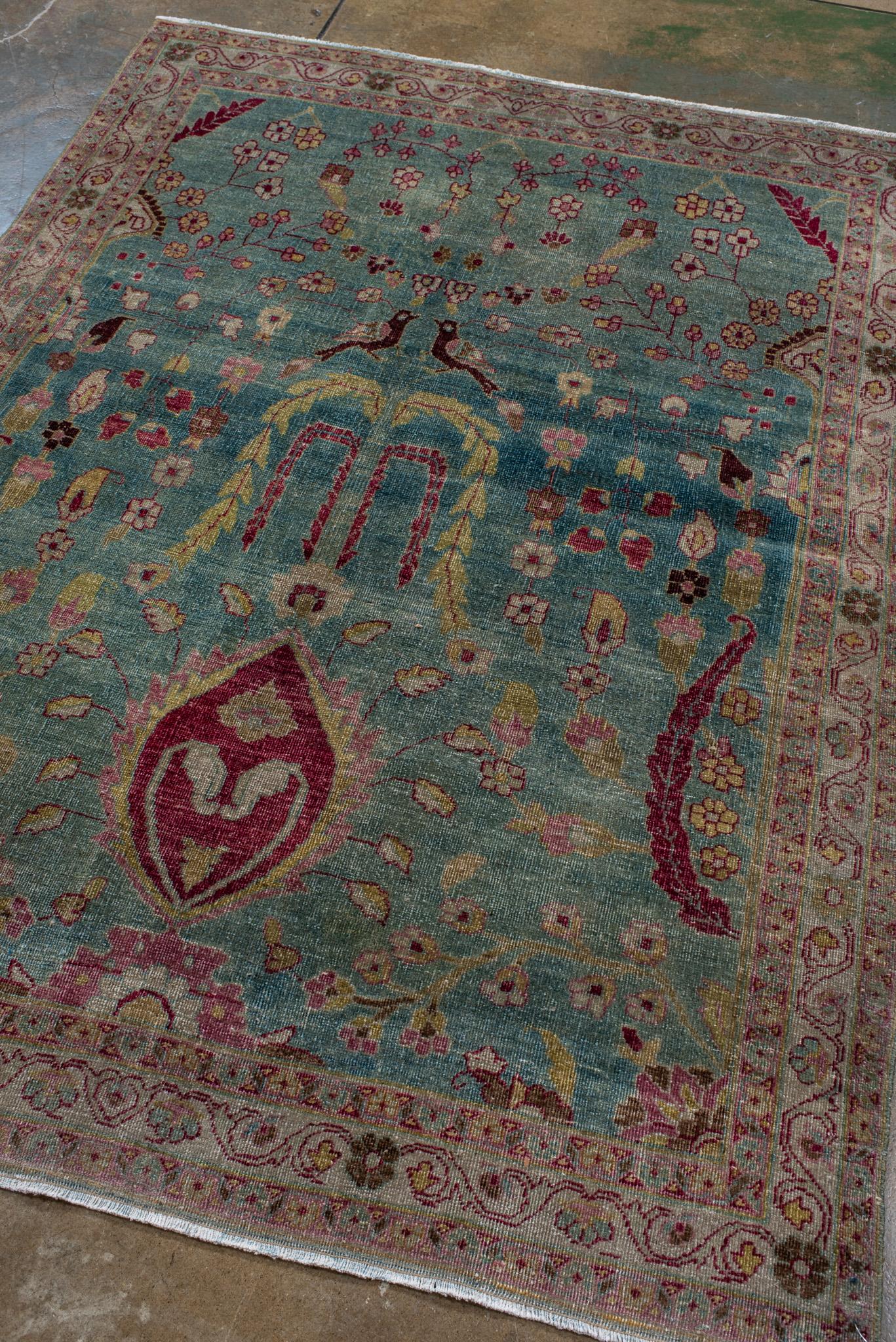 A Meshed Rug circa 1920. Handknotted with 100% wool yarn.