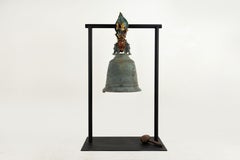A Metal Burmese Bell on a Base with Garula and Narasimha
