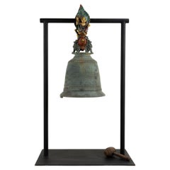 A Metal Burmese Bell  on a Base with Garula and Narasimha