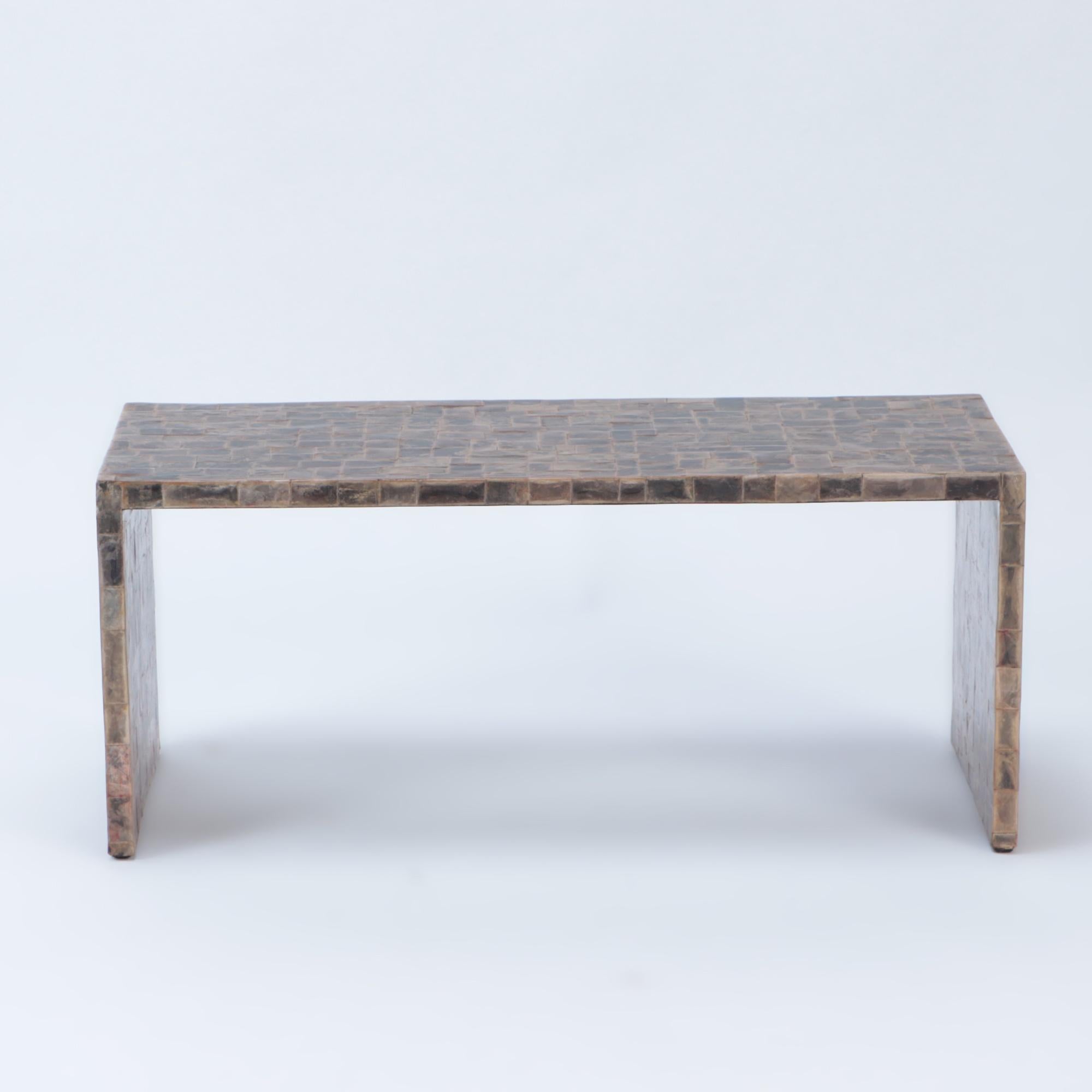 A mica covered coffee table in the manner of Jean-Michel Frank. Contemporary.